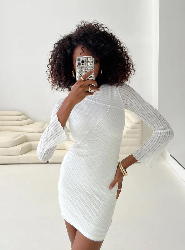 Mini dresses with tassel accents for a fun touch Raisa Long Sleeve Mini Dress White