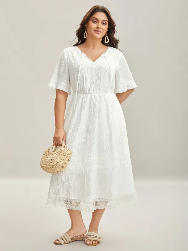 Zip - Front Casual Dresses for Easy On and Off​ Textured Cut-Out Lace Tied Midi Dress
