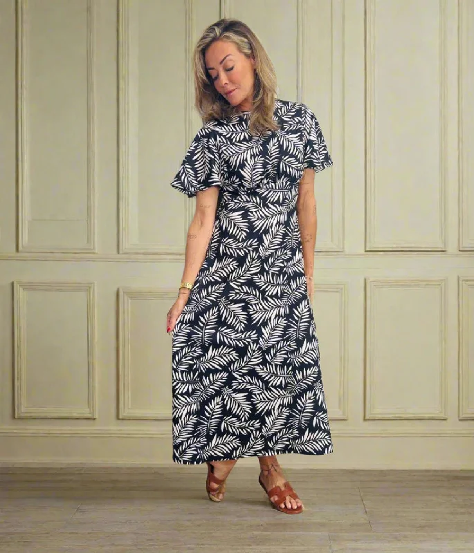 Fair Isle - Patterned Casual Dresses for a Festive Look Black & Ivory Leaf Print Kate Midi Dress Fair Isle - Patterned Casual Dresses for a Festive Look Black & Ivory Leaf Print Kate Midi Dress