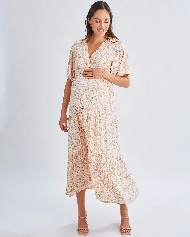 Maxi dresses with a V - neckline for a flattering and elongating shape Cara Maternity Maxi Dress in Creamy Floral Glow Maxi dresses with a V - neckline for a flattering and elongating shape Cara Maternity Maxi Dress in Creamy Floral Glow