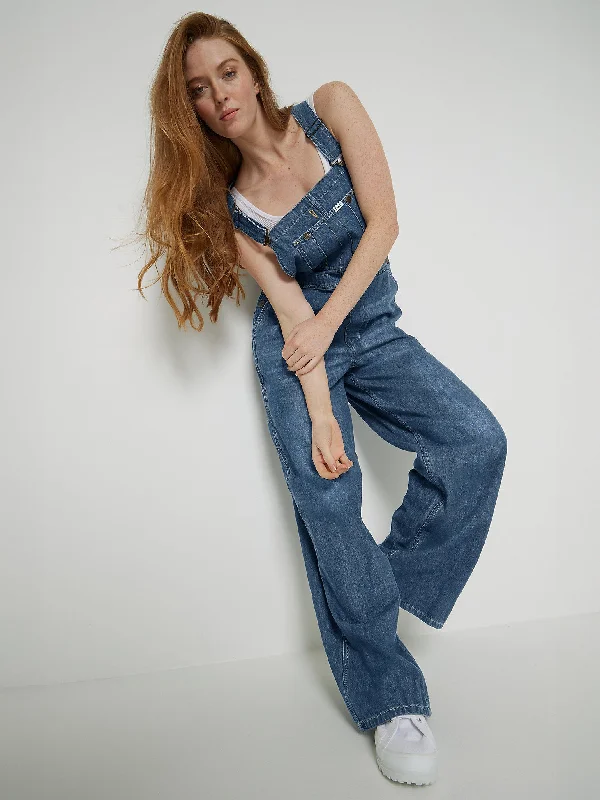 Women jumpsuits with tassel trims for a playful and fashionable touch Bib Overall - Mid Cascade Women jumpsuits with tassel trims for a playful and fashionable touch Bib Overall - Mid Cascade