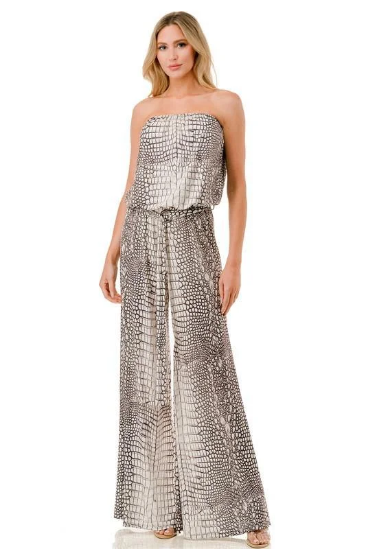 Women jumpsuits with asymmetric hems on the pants for a fashion - forward and dynamic look Wide Leg Jumpsuit with Silver Ring Belt Women jumpsuits with asymmetric hems on the pants for a fashion - forward and dynamic look Wide Leg Jumpsuit with Silver Ring Belt