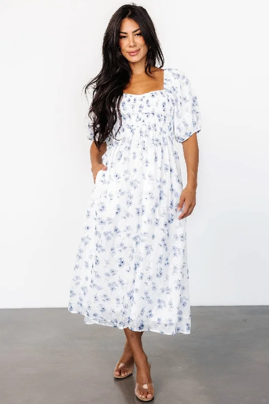Midi dresses with keyhole backs for a flirty and unexpected detail Luca Dress | White + Blue Floral Midi dresses with keyhole backs for a flirty and unexpected detail Luca Dress | White + Blue Floral